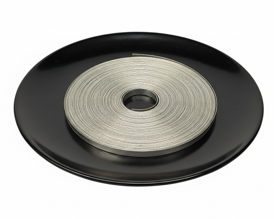 Magnesium Ribbon 75-Ft on a black plate