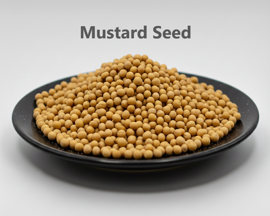 Mustard seeds on a black plate with 'Mustard Seed' text above.