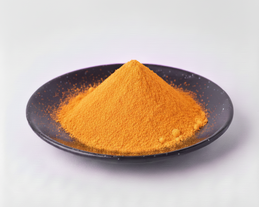 Orange chalk powder on a black plate