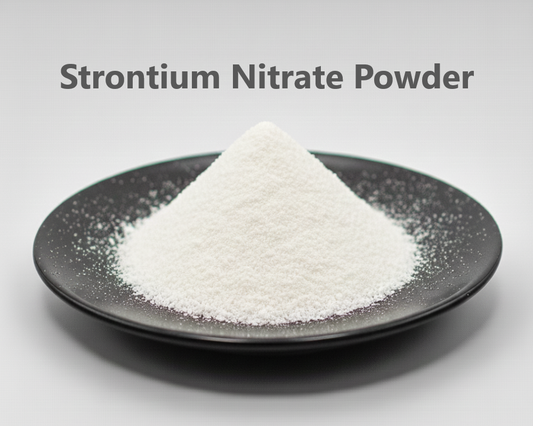 Strontium Nitrate Powder on a black plate.